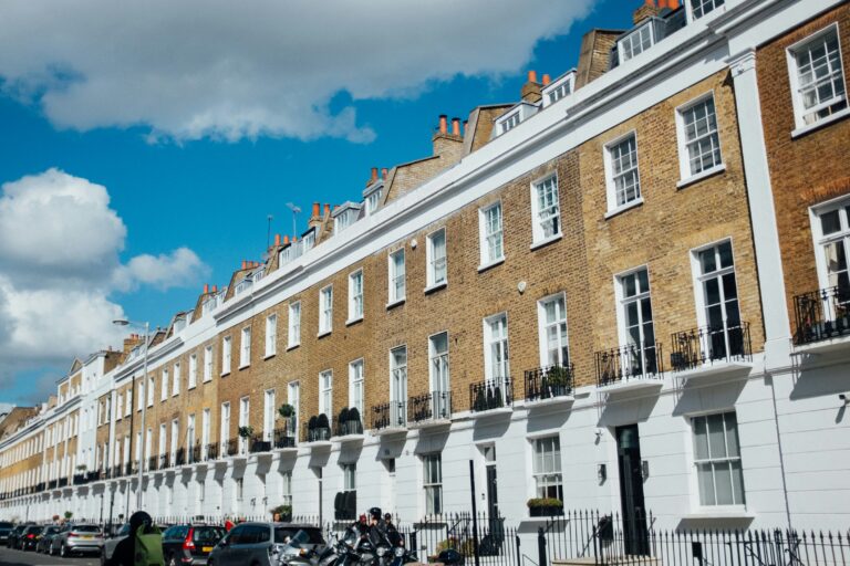 Row of traditional English terraced houses on a residential street